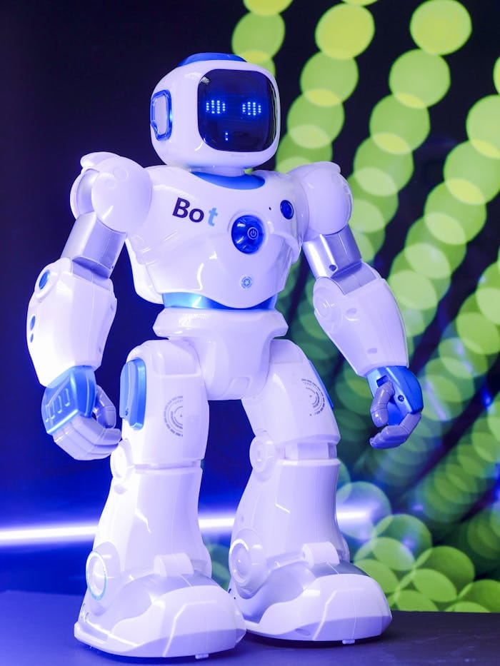 Portfolio High-tech humanoid robot with glowing LED display and futuristic design.
